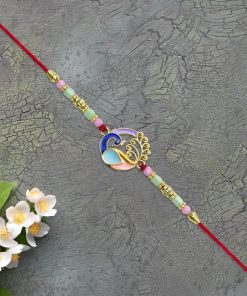 Elegant Conch Shell Rakhi with Enamel Detailing and...