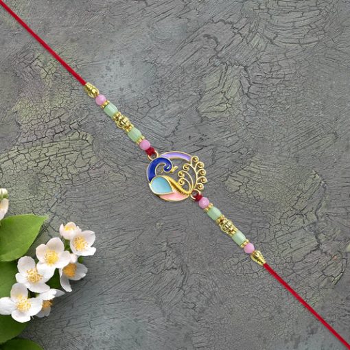 Elegant Conch Shell Rakhi with Enamel Detailing and...