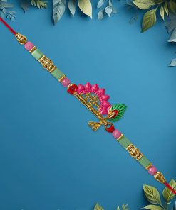Mor Pankh Flute Rakhi with Pink Accents