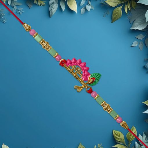 Mor Pankh Flute Rakhi with Pink Accents