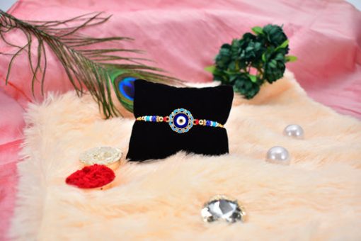 Evil Eye Rakhi with Blue Beads and Golden...