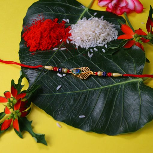 Peacock Feather Design Rakhi with Beaded Detailing and...