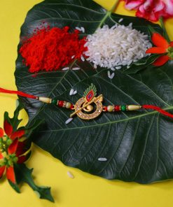 Krishna Flute Rakhi with Stone Studded Peacock Feather...
