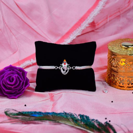 Stylish Ganesha Rakhi with Enamel Highlights and Silver...