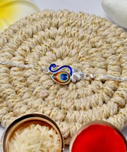 Elegant Silver Peacock Rakhi with Tricolor Enamel –...
