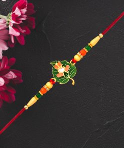 Green Tulsi Leaf Rakhi with Orange Enamel Flower...